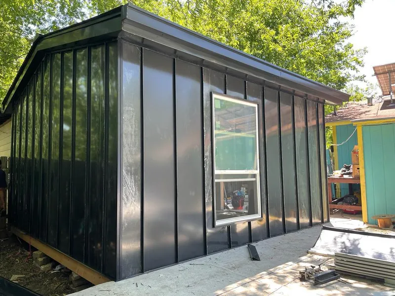 Black standing seam metal wall panels for Metal Roof Installation in Baxter Village